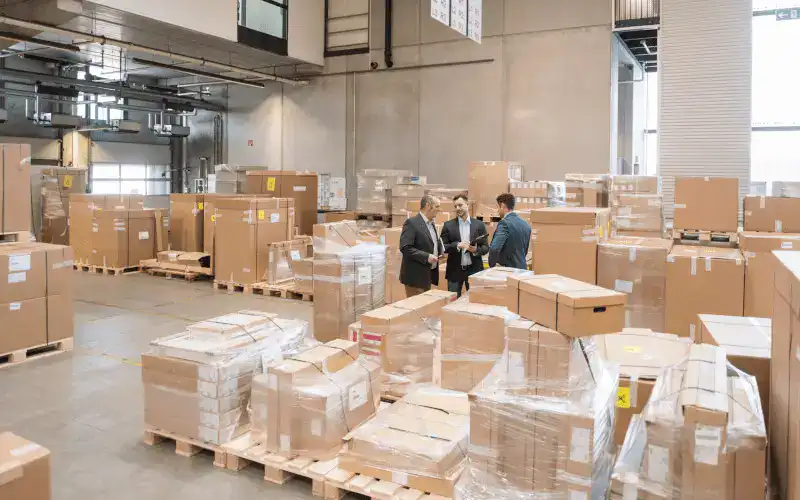 three men discussing about last mile delivery contractual packages