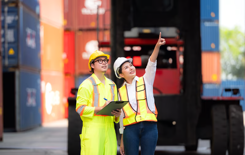 Workers observing working environment